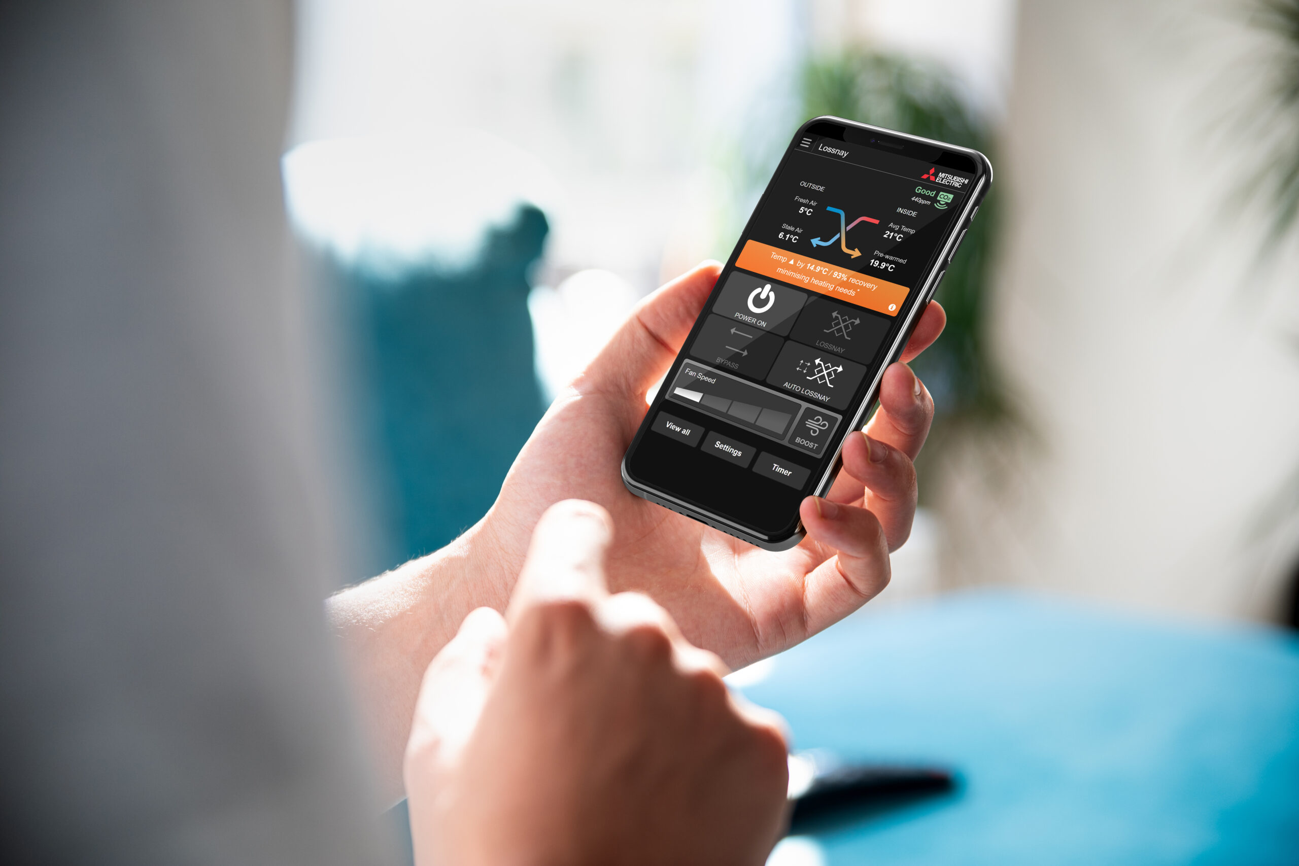 Man using smartphone blank screen frameless modern design while